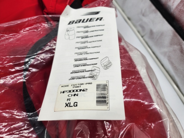 1011467-2 Nike Bauer hockey pants, yellow/red Size XL - Shipping included