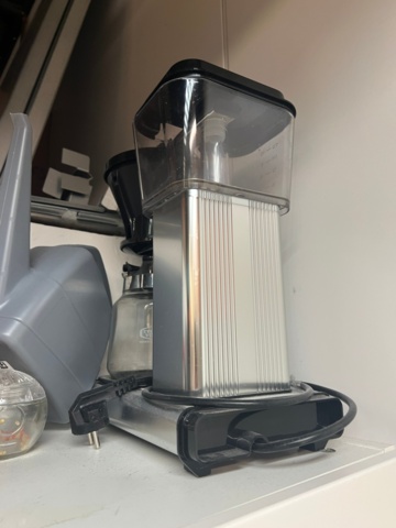 981061-6 Kitchen table with chairs, coffee maker and queue utensils