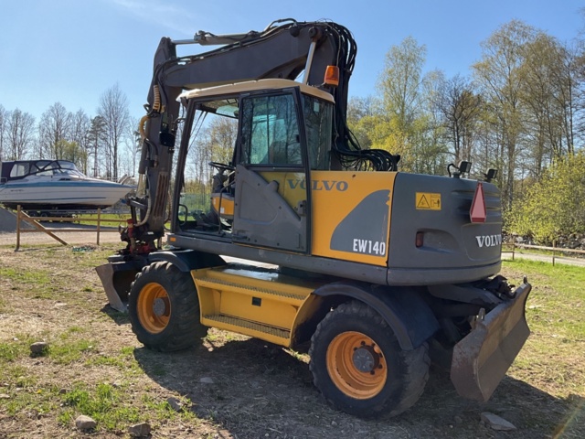 1001990-5 Hjulgrävare Volvo EW140  - 2000