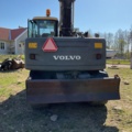 1001990-6 Hjulgrävare Volvo EW140  - 2000