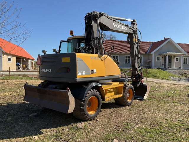 1001990-7 Hjulgrävare Volvo EW140  - 2000