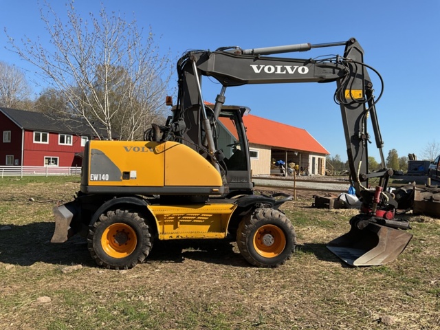 1001990-8 Hjulgrävare Volvo EW140  - 2000
