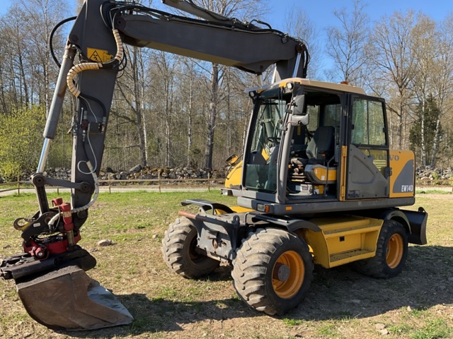 1001990-34 Hjulgrävare Volvo EW140  - 2000