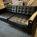1025959-1 Black leather sofa.