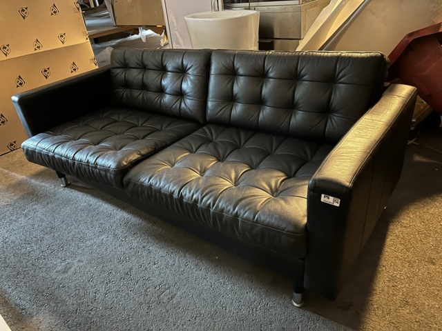 1025959-1 Black leather sofa.