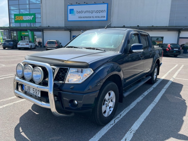 213405-9 Nissan Navara double cab 2.5 dCi 4x4 - 2010