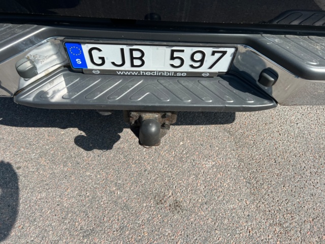 213405-27 Nissan Navara double cab 2.5 dCi 4x4 - 2010