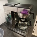 1013170-9 Coffee room with table, 2 chairs, 2 coffee makers, clothes hangers, etc