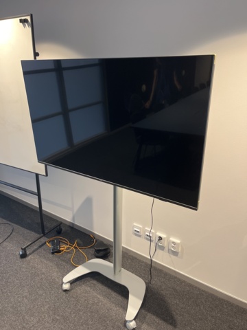 1013172-7 Conference room with Philips 55" TV, table & 16 chairs