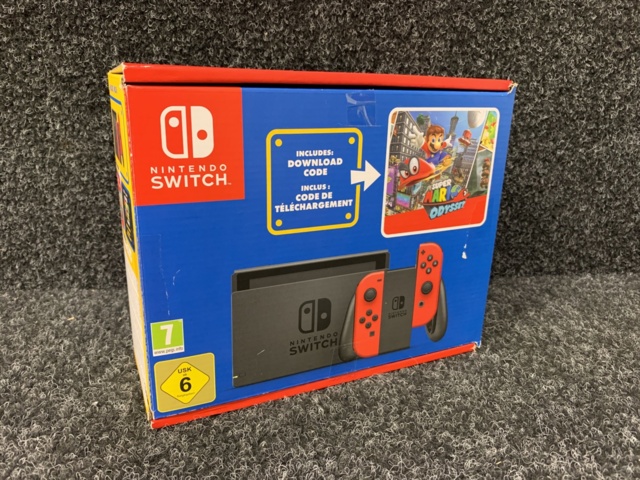 1058576-3 Nintendo Switch (Red Joy-Con pair) incl Super Mario Odyssey