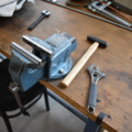 1035783-4 Work table with vise, chair and tools
