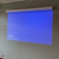 998780-28 Large screen projector with sound system & project screen.
