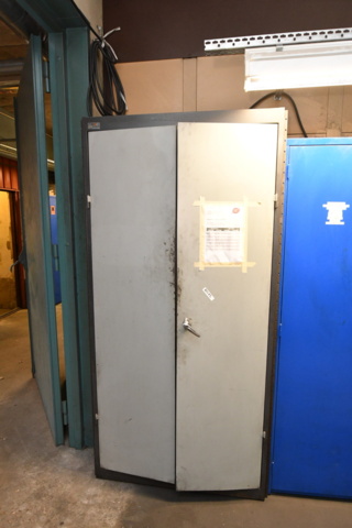 1080252-2 Sheet metal cabinet with various drills