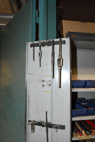 1080252-7 Sheet metal cabinet with various drills