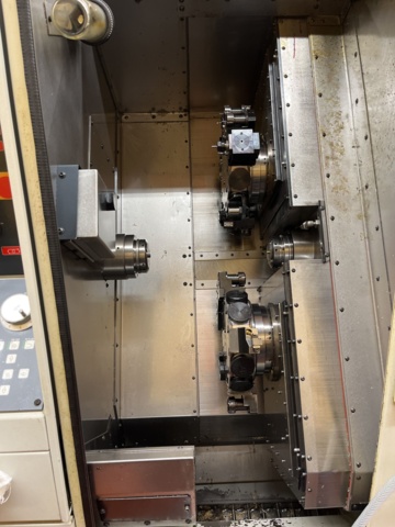 1078381-9 CNC lathe TRAUB TNC 30 TGY incl. FMB Turbo 3-36 Bar feeder