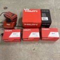 1029886-1 3 new Hilti batteries, 1 new Hilti charger and older charger with battery