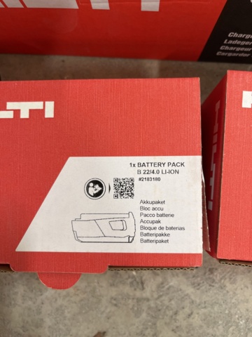 1029886-3 3 new Hilti batteries, 1 new Hilti charger and older charger with battery