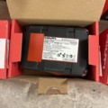 1029886-5 3 new Hilti batteries, 1 new Hilti charger and older charger with battery
