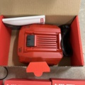 1029886-7 3 new Hilti batteries, 1 new Hilti charger and older charger with battery