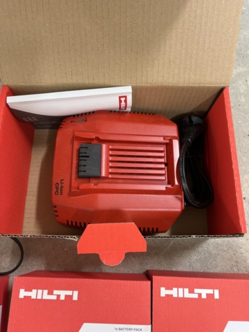 1029886-7 3 new Hilti batteries, 1 new Hilti charger and older charger with battery