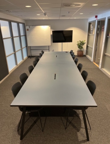 1078422-1 Large conference table & 14 chairs as well as stand for screen