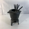 1108493-4 Fondue pot in cast iron and 6 forks with wooden handles