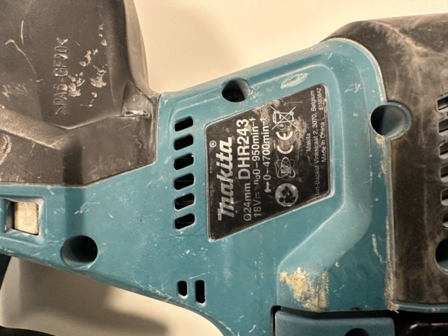 1071404-3 Hammer drill Makita with vacuum cleaner attachment DHR243 and DX07