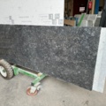 1112201-1 Black iridescent stone slab, glossy. About 250 cm long & 77 cm wide. 20 mm thick
