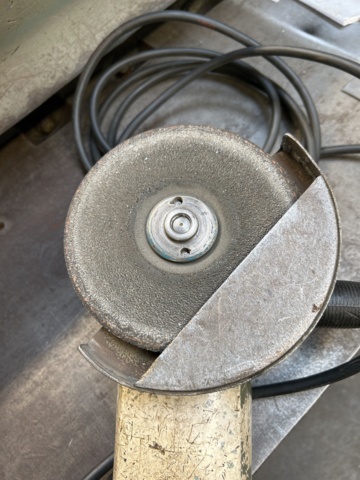 1065062-3 Older model angle grinder