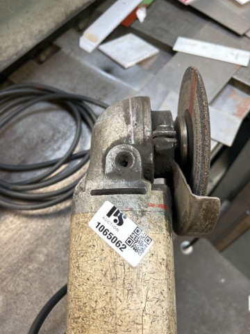 1065062-4 Older model angle grinder