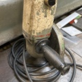1065062-6 Older model angle grinder
