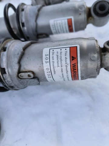 1128895-10 Stötdämpare för skoter