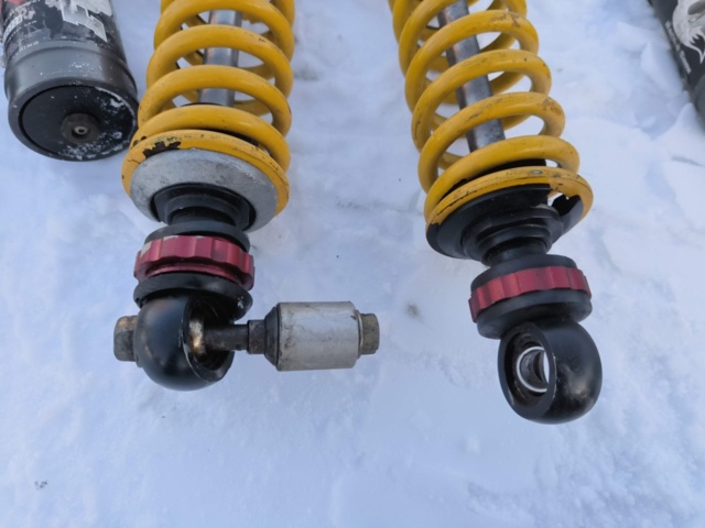 1128895-12 Stötdämpare för skoter