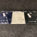 1128704-2 3 polo shirts Lacoste, Size M