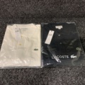 1128701-2 2 polo shirts Lacoste, Size M