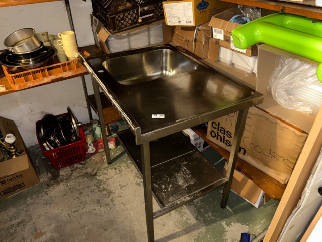 1144223-4 Storage room with various restaurant equipment