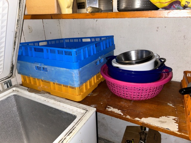 1144223-5 Storage room with various restaurant equipment