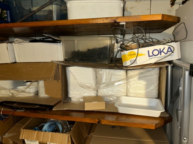 1144223-10 Storage room with various restaurant equipment