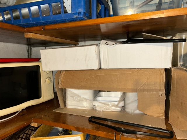 1144223-11 Storage room with various restaurant equipment