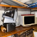 1144223-12 Storage room with various restaurant equipment