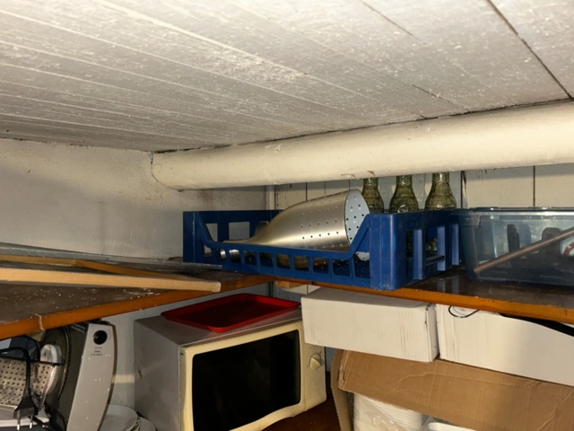 1144223-13 Storage room with various restaurant equipment