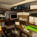 1144223-3 Storage room with various restaurant equipment