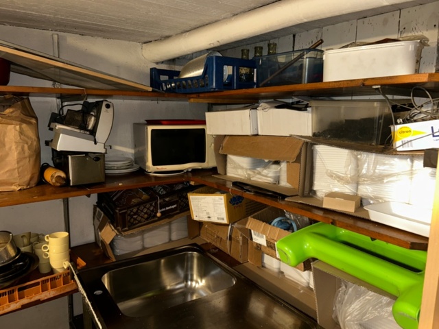 1144223-3 Storage room with various restaurant equipment