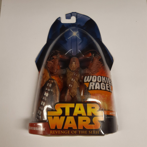 1199893-1 Lot of Star Wars action figures from 2005 in unbroken packaging.