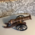 1121807-7 Brass cannon & striker-fired gun