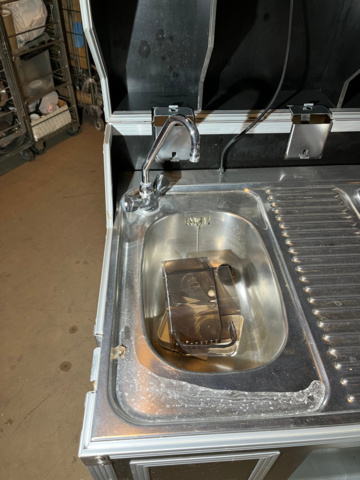 1194268-13 Mobile kitchen with hotplates, fridge, tap and sink as well as water heater