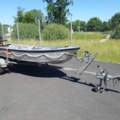 1035933-3 Buster aluminum boat on trailer and 4-stroke engine