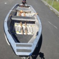 1035933-6 Buster aluminum boat on trailer and 4-stroke engine