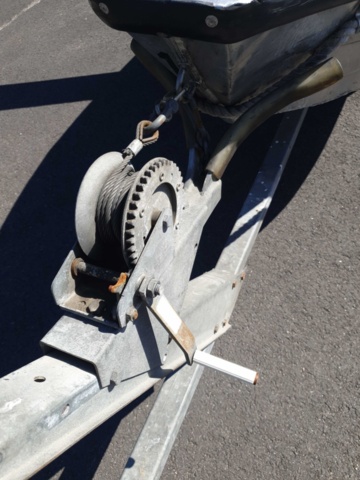 1035933-37 Buster aluminum boat on trailer and 4-stroke engine
