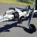 1035933-36 Buster aluminum boat on trailer and 4-stroke engine